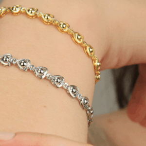 Pulseira corações trabalhados ouro